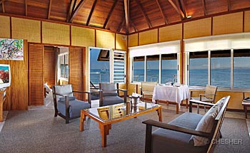 Lounge of the Overwater Bungalow at l'Escapade Island Resort